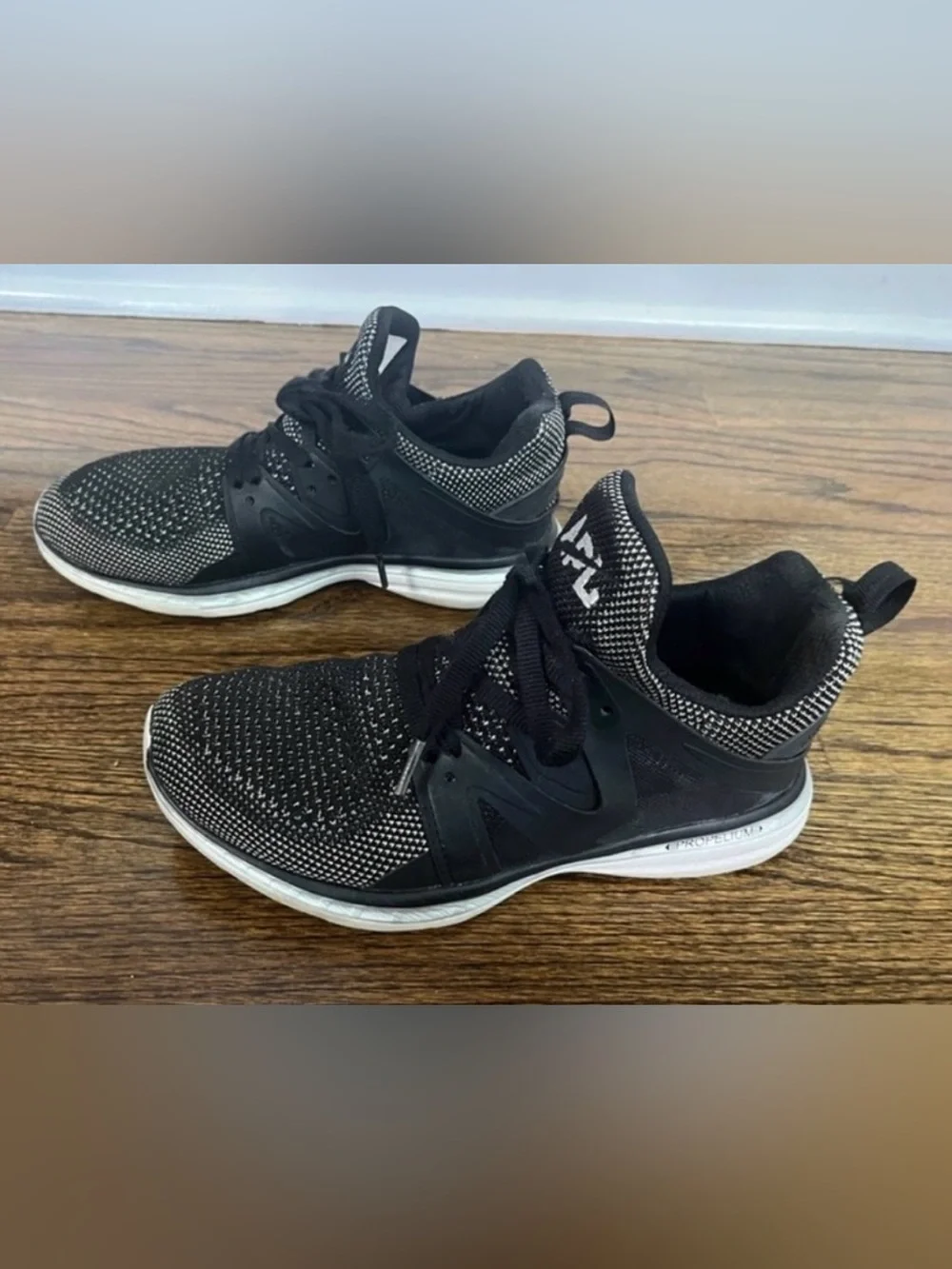 APL Ascends black and silver tennis shoes